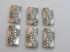 Silver tone plated oblong metal beads with animal skin design - 4 beads - BD431