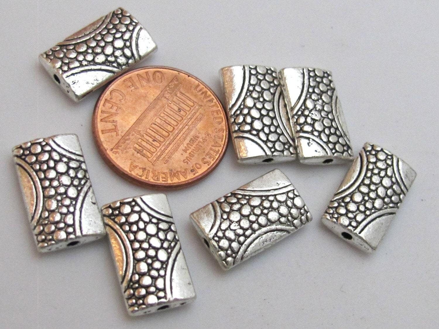 Silver tone plated oblong metal beads with animal skin design - 4 beads - BD431
