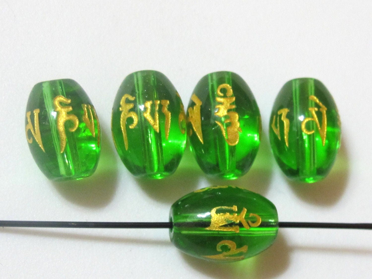 Bicone rice shape Tibetan om mantra etched green quartz beads 12 mm - 4 beads - GM257