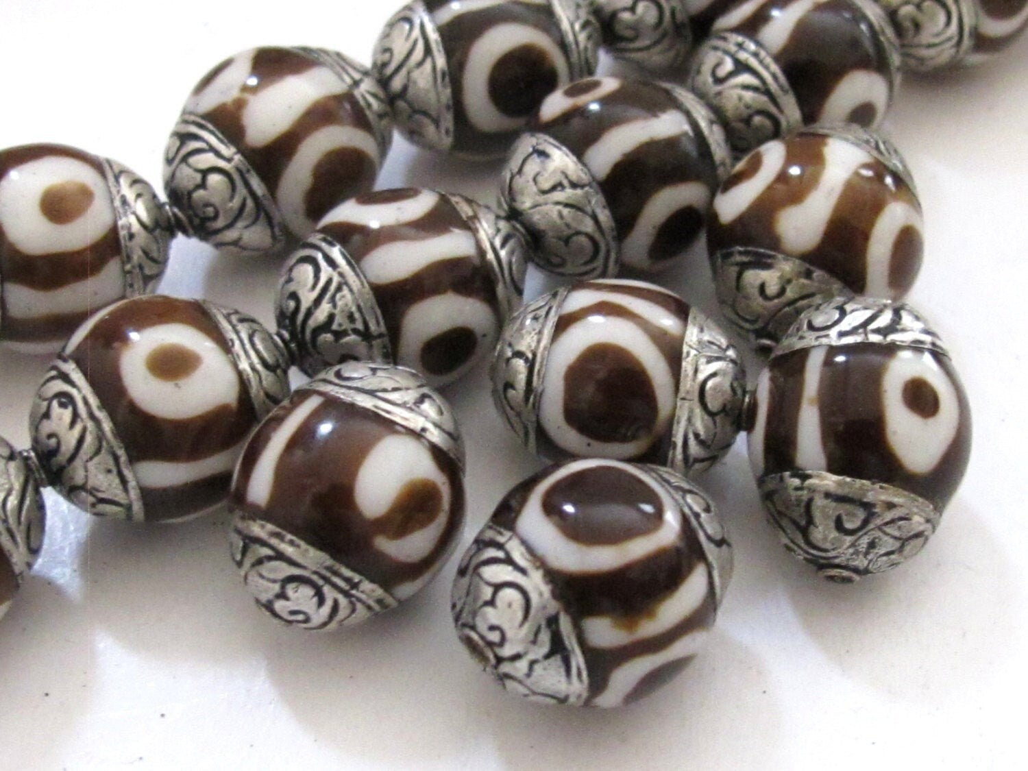 2 BEADS - Tibetan silver capped batik dzi design bone bead - BD522A