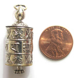Tibetan antiqued silver Om Mantra with auspicious symbols spinnable prayer wheel scroll pendant light-weight Nepal - SP022