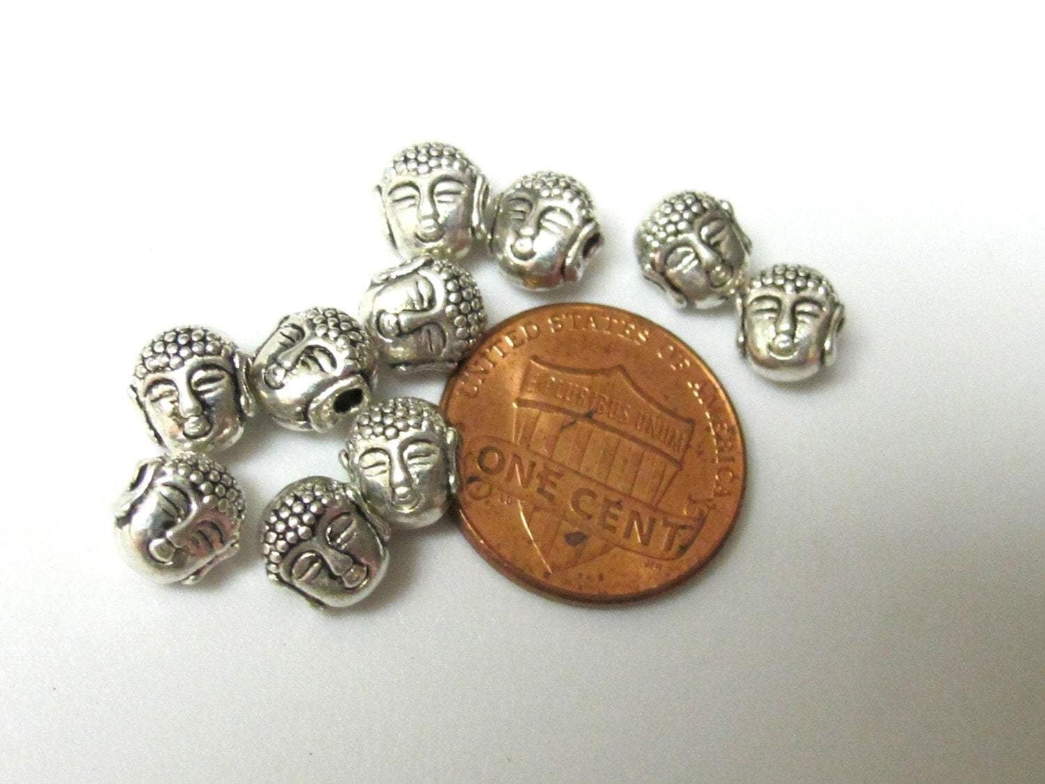 10 Beads - Dual sided Tibetan Buddha bead - BD386