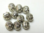 10 Beads - Dual sided Tibetan Buddha bead - BD386