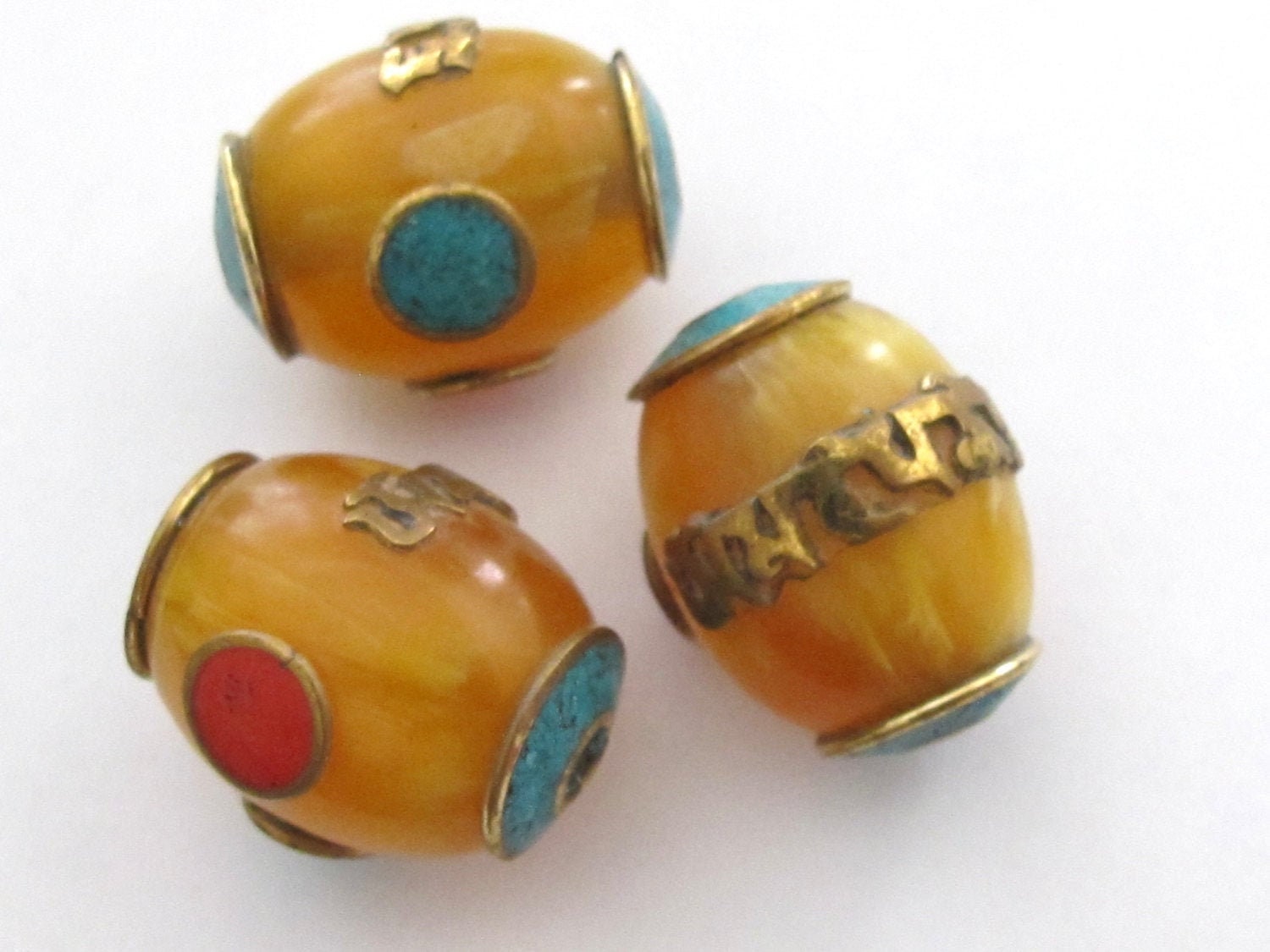 1 Bead - Tibetan copal resin Om mantra bead with brass , turquoise and coral inlay - BD375