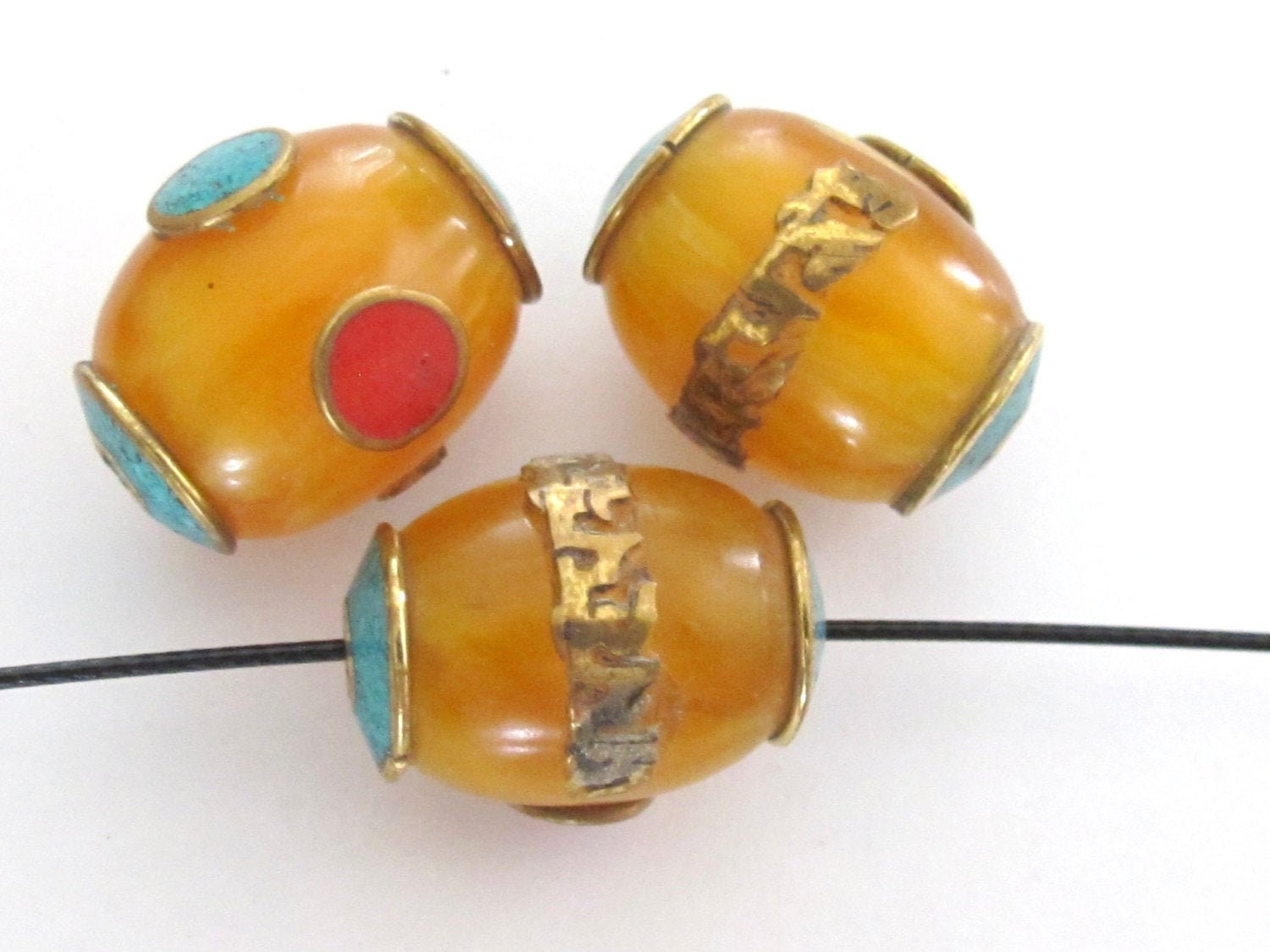 1 Bead - Tibetan copal resin Om mantra bead with brass , turquoise and coral inlay - BD375