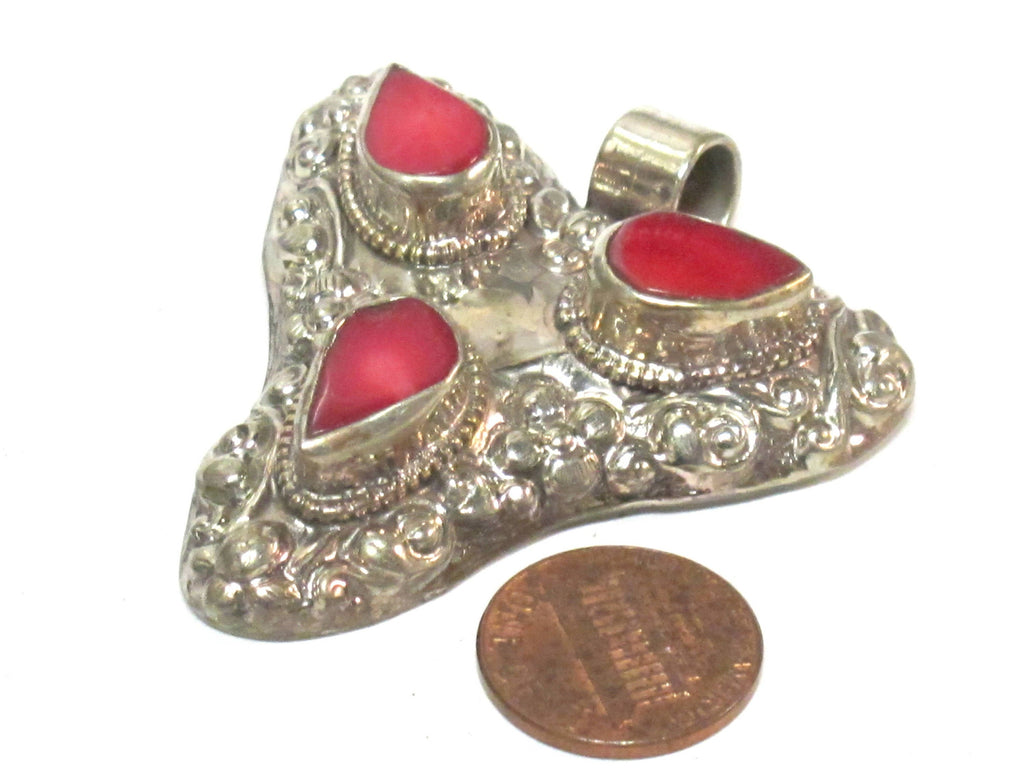 1 Pendant - Ethnic Tibetan triangular arrowhead shape coral inlaid pendant from Nepal with floral fish carving on reverse side - PM585B