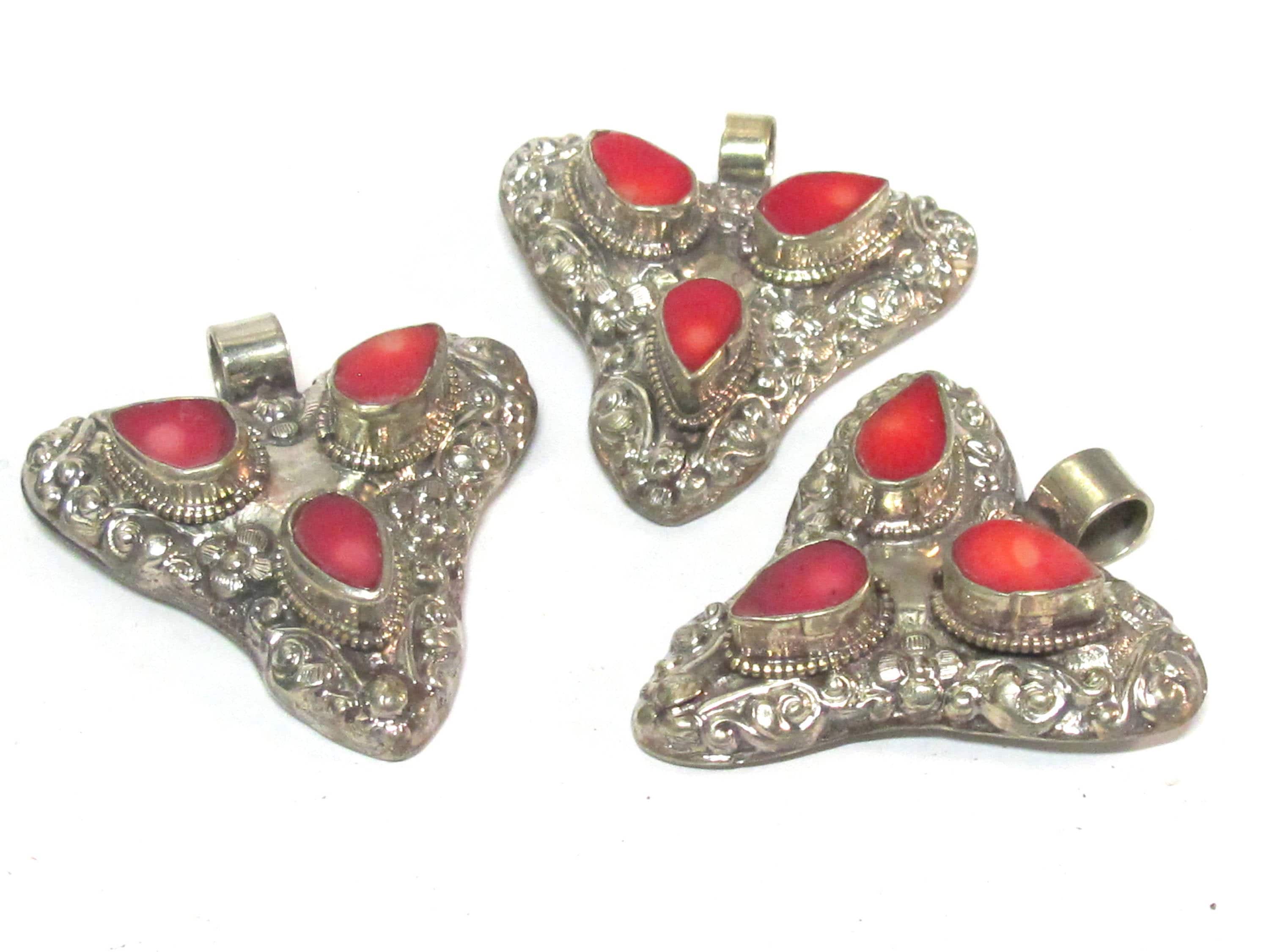 1 Pendant - Ethnic Tibetan triangular arrowhead shape coral inlaid pendant from Nepal with floral fish carving on reverse side - PM585B