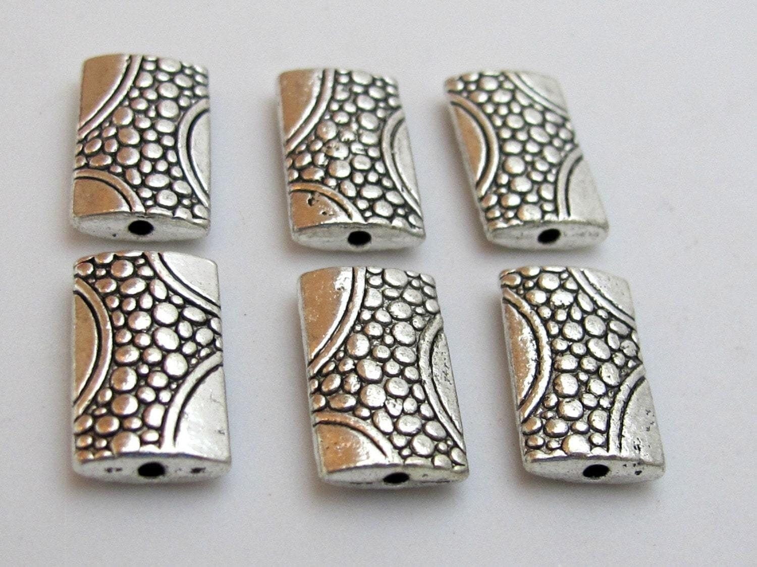 Silver tone plated oblong metal beads with animal skin design - 4 beads - BD431