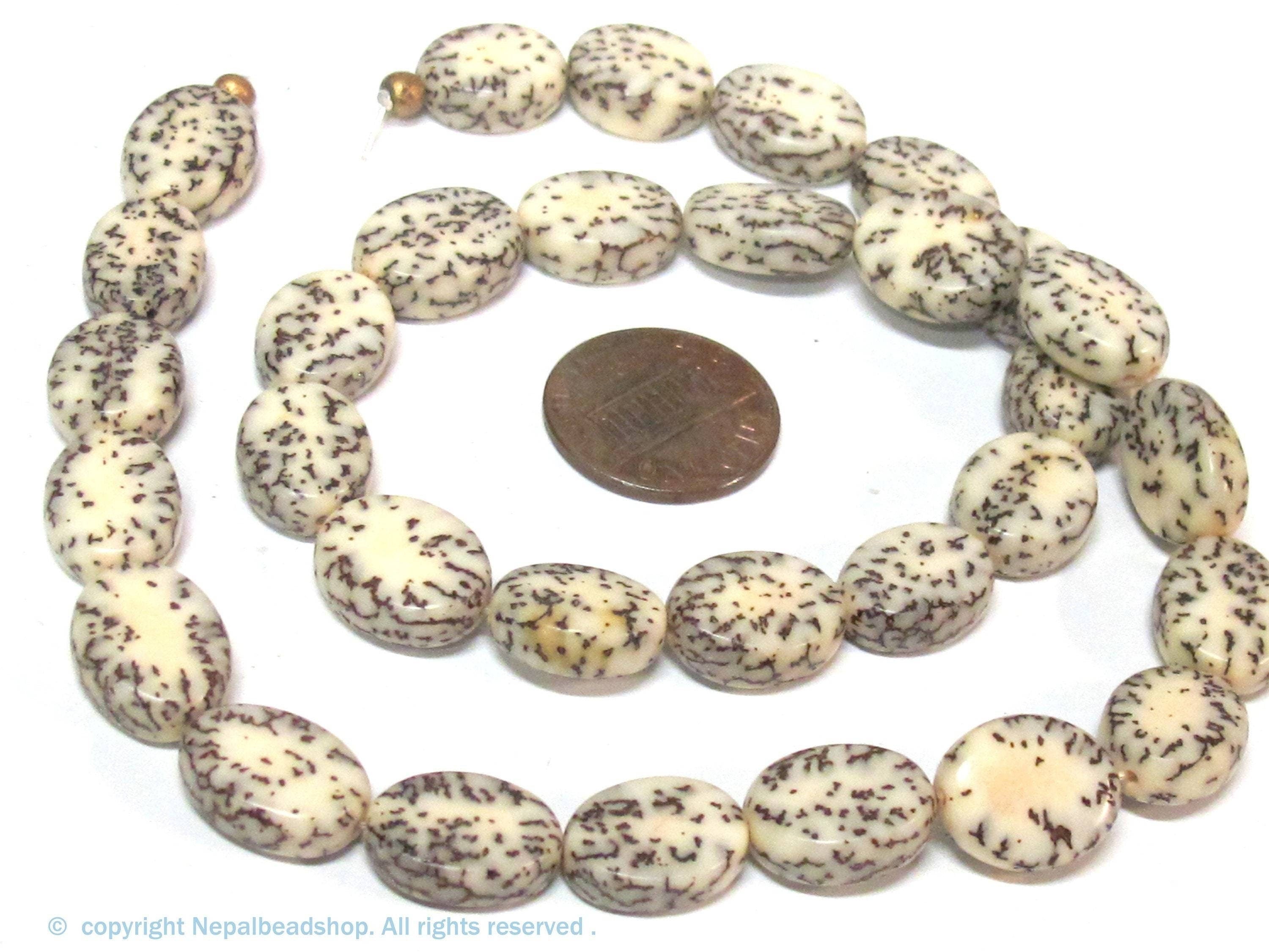 1 full strand -Natural salwag flat oval shape seed beads - NB035B