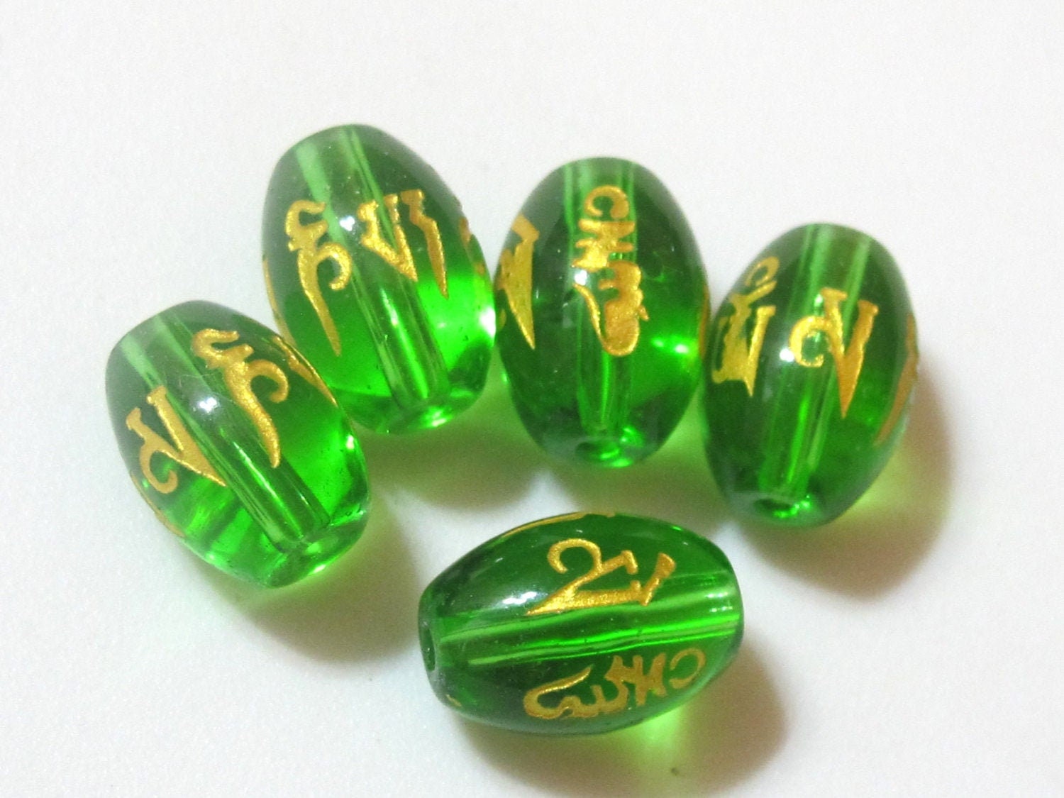 Bicone rice shape Tibetan om mantra etched green quartz beads 12 mm - 4 beads - GM257