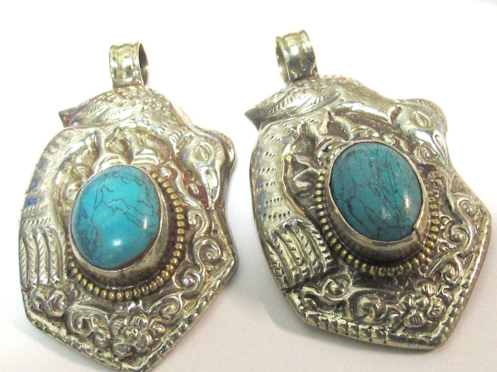 Tibetan silver repousse bird pendant inlaid with turquoise inlay- ethnic nepal pendant - PM271Bx
