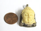 1 pendant - Tibetan Nepal resin Buddha face pendant with floral carving on other side-- PM485B