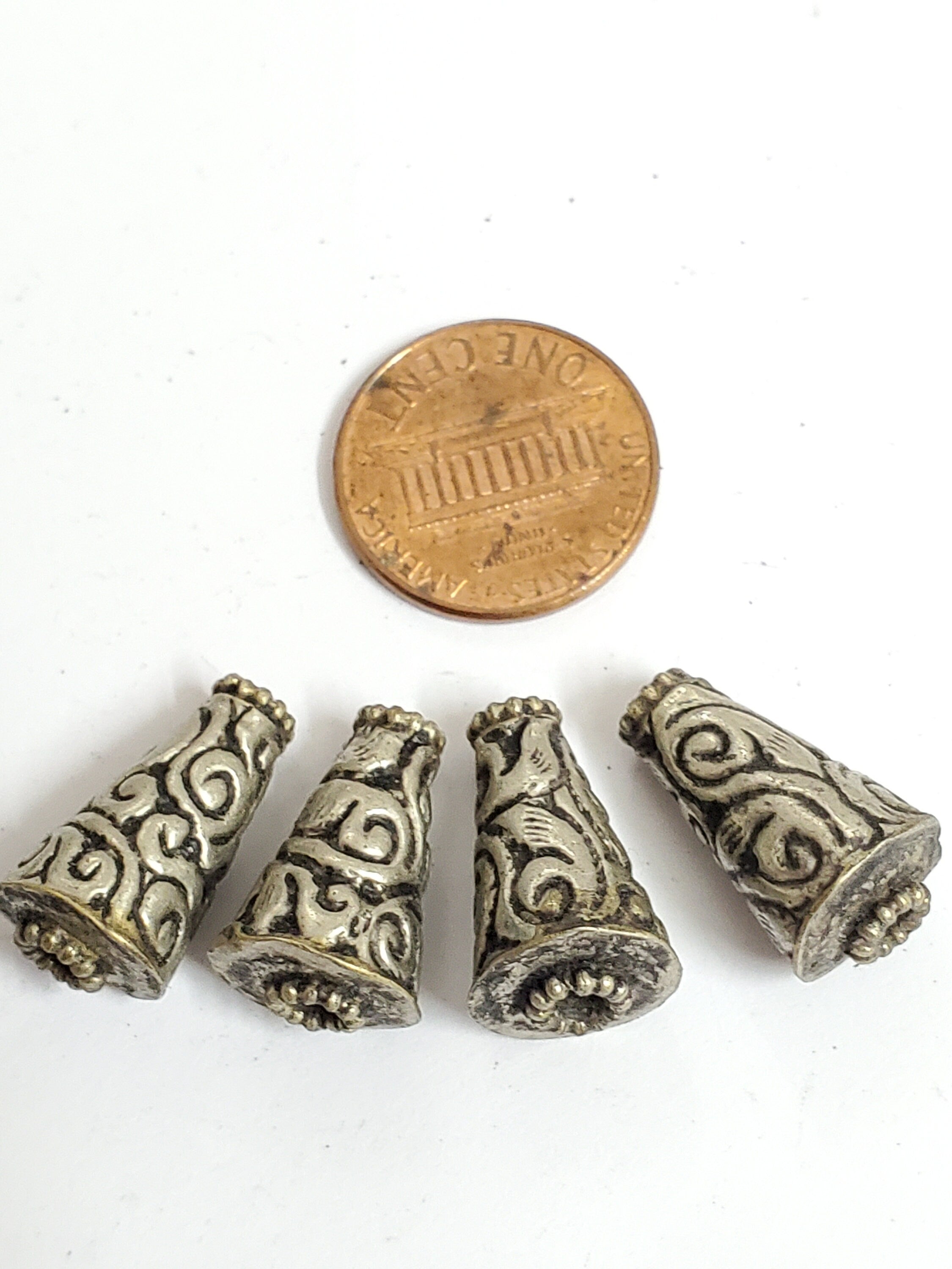 4 BEADS - Tibetan antiqued silver finish repousse floral design conical cone shape beads handcrafted Nepal 10 mm x 17 -18 mm - BD353B