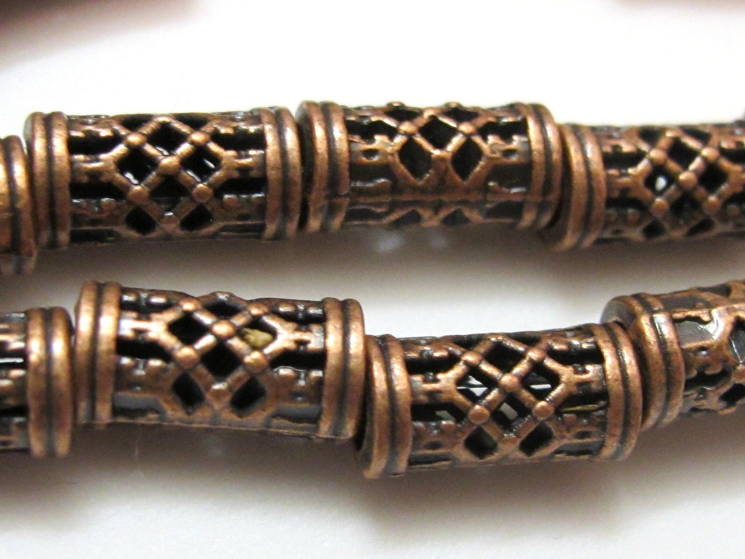 4 Beads-Copper tone metal tube weave design beads- BD182