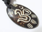 Carved OM bone pendant - PB006