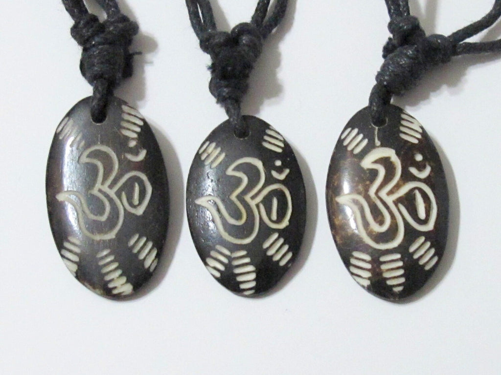 Carved OM bone pendant - PB006