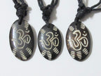 Carved OM bone pendant - PB006