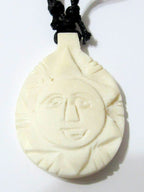 Cream color carved face recycled cattle bone pendant from Nepal - PB015