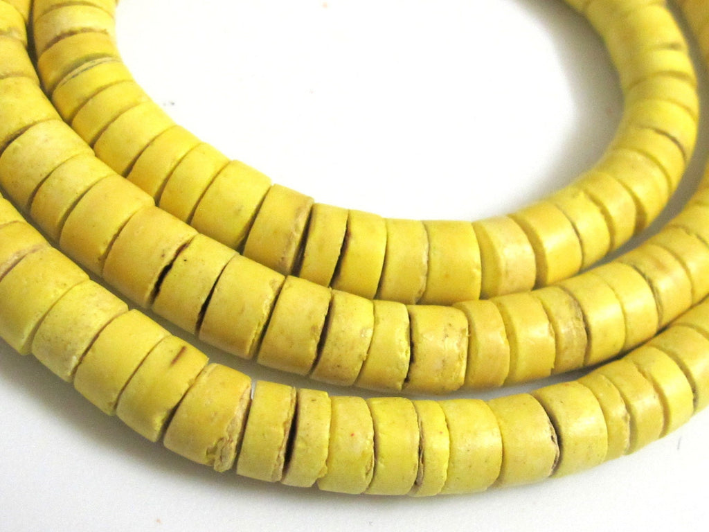 Yellow rondelle natural coconut beads long strand 22 inches - NB018