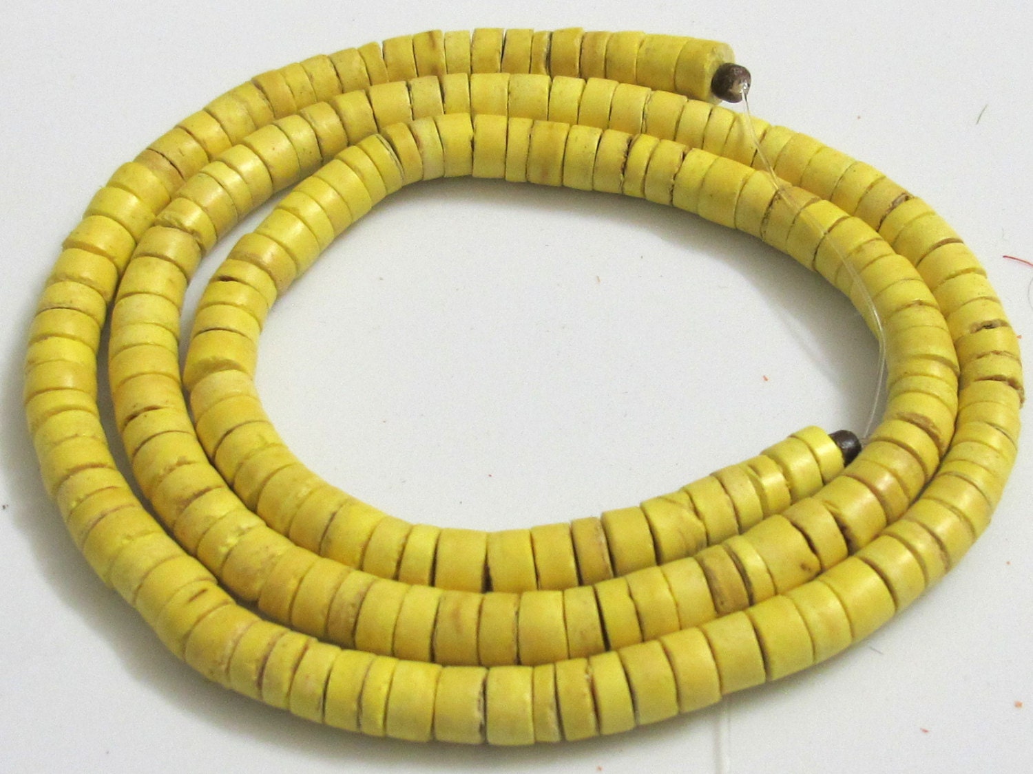 Yellow rondelle natural coconut beads long strand 22 inches - NB018