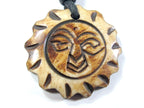 This is a round sun face recycled cattle bone pendant - PB031