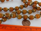 4 BEADS - Tibetan copal resin brass capped beads - BD474B