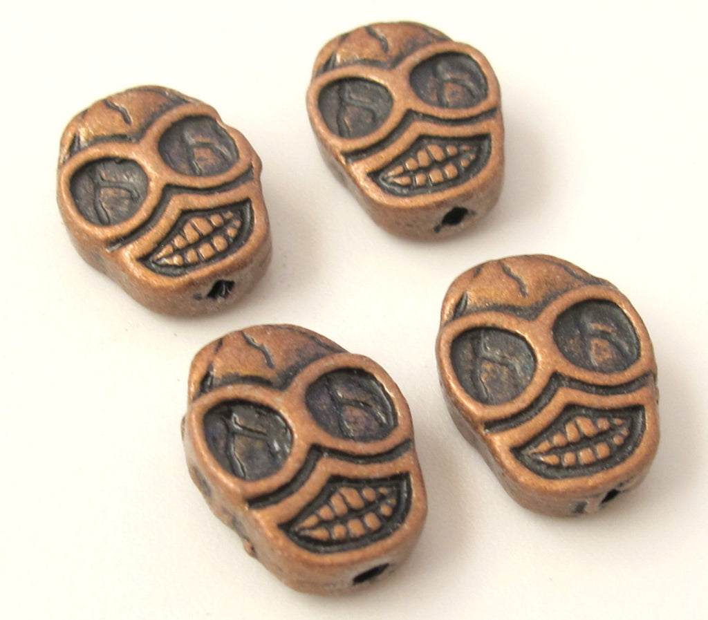 4 beads - Copper tone finish metal skull beads - BD352