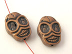 4 beads - Copper tone finish metal skull beads - BD352