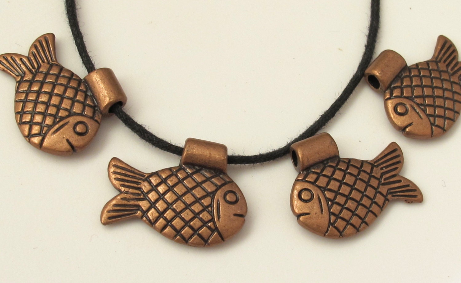 4 pieces - Dual sided Copper finish cute detailed fish design metal pendant charm beads - BD364