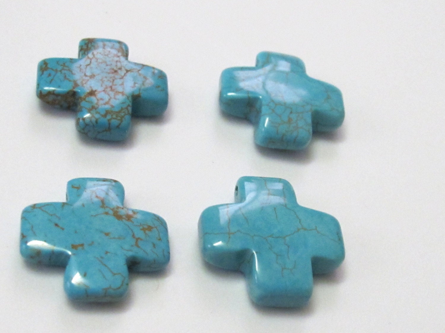 Turquoise howlite cross charm beads - 4 pieces - GM189