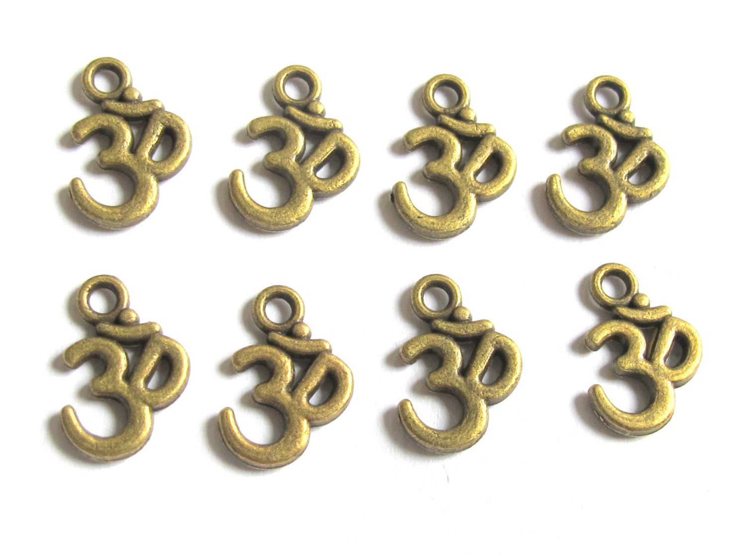 Brass tone yoga meditation om metal charms beads - 10 pieces - BD329