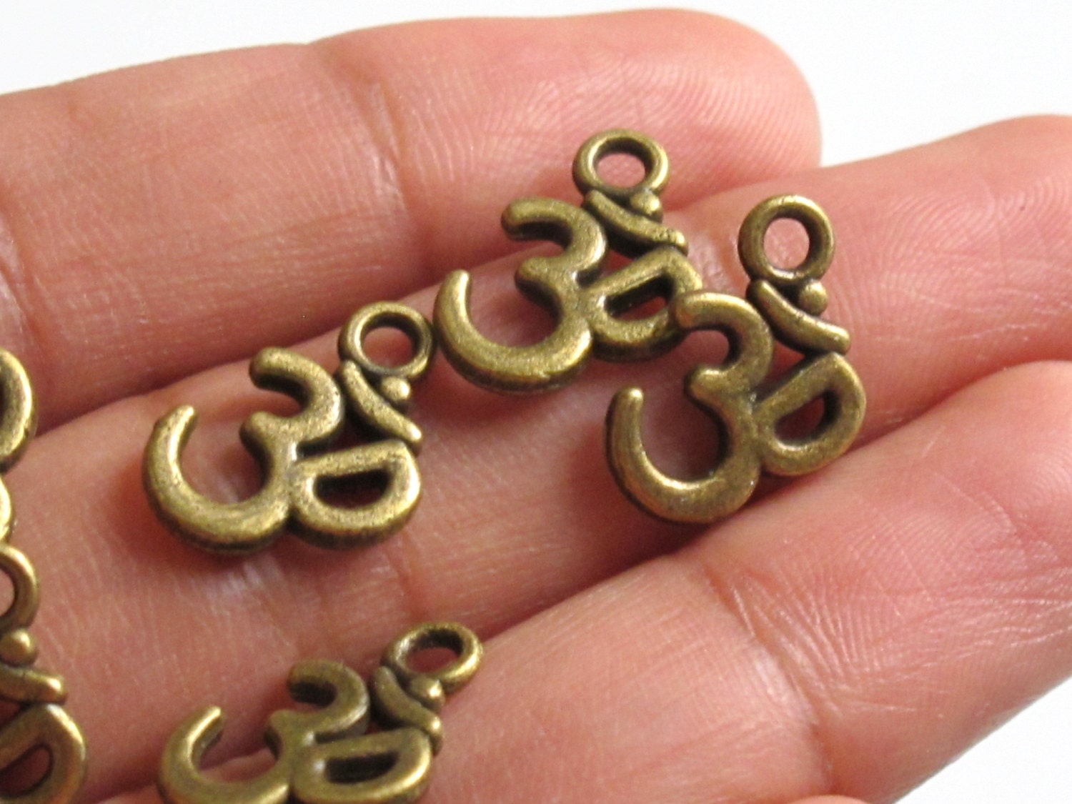 Brass tone yoga meditation om metal charms beads - 10 pieces - BD329