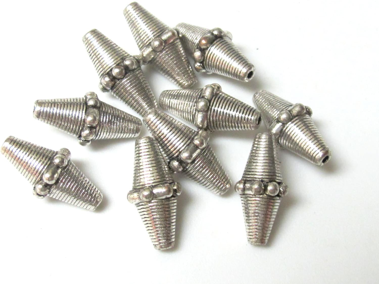 Tibetan Silver tone bicone metal beads - 4 beads - BD388