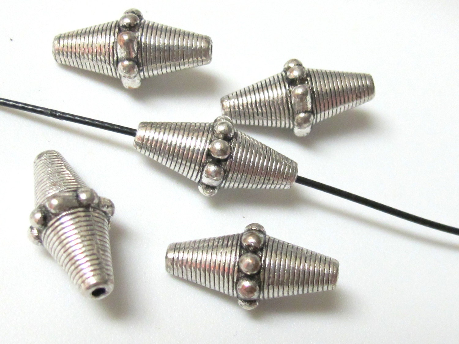 Tibetan Silver tone bicone metal beads - 4 beads - BD388