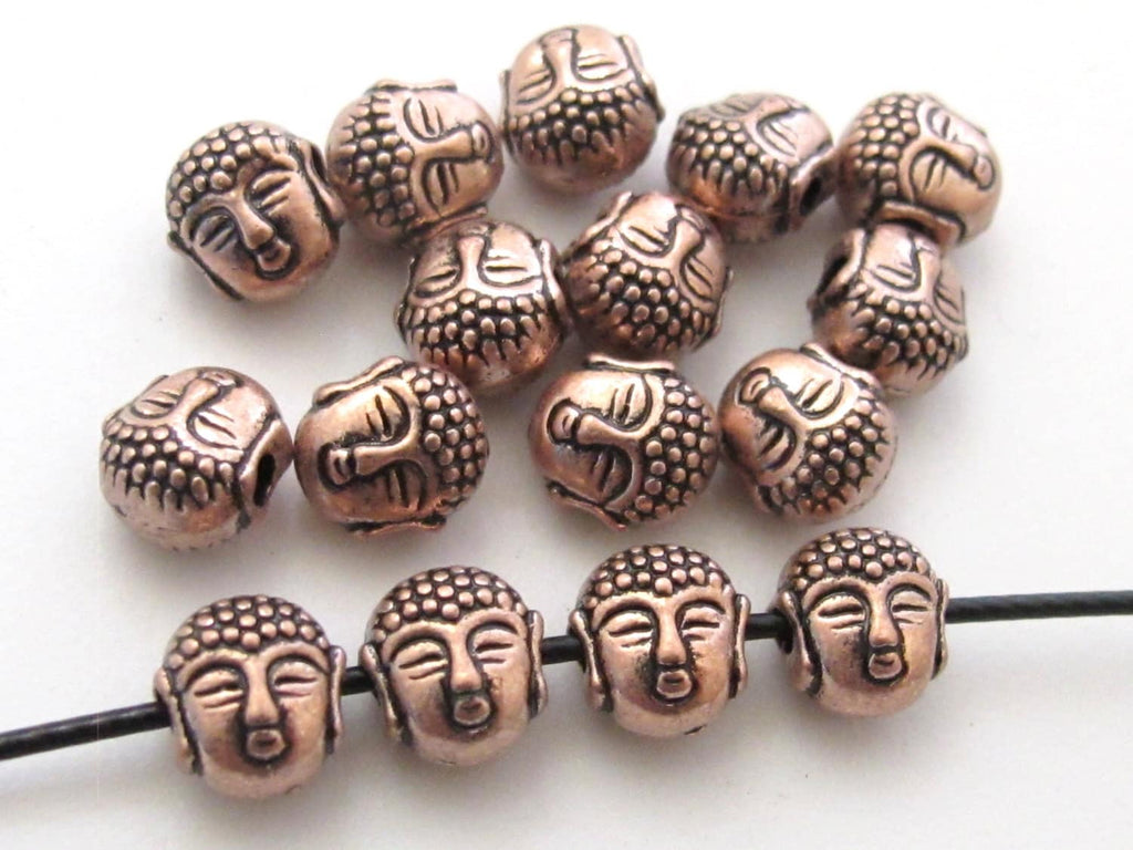 Small size reversible Tibetan Buddha copper tone color metal beads - 4 beads - BD422