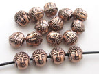 Small size reversible Tibetan Buddha copper tone color metal beads - 4 beads - BD422