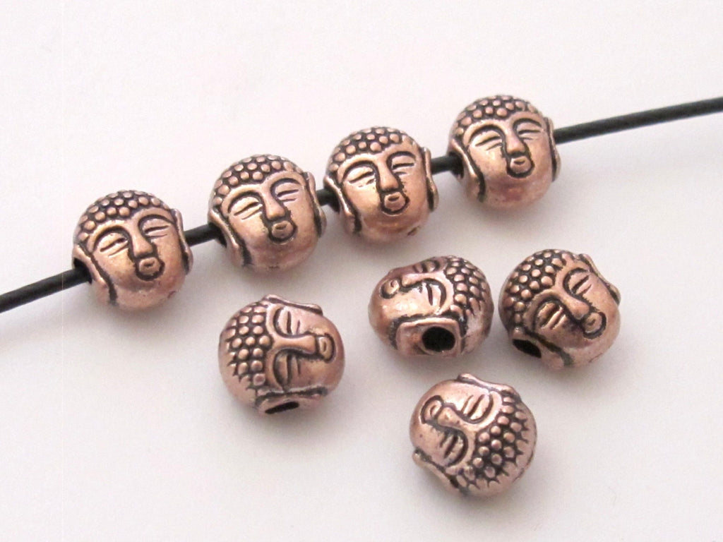 Small size reversible Tibetan Buddha copper tone color metal beads - 4 beads - BD422