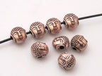 Small size reversible Tibetan Buddha copper tone color metal beads - 4 beads - BD422