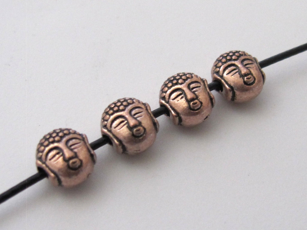 Small size reversible Tibetan Buddha copper tone color metal beads - 4 beads - BD422