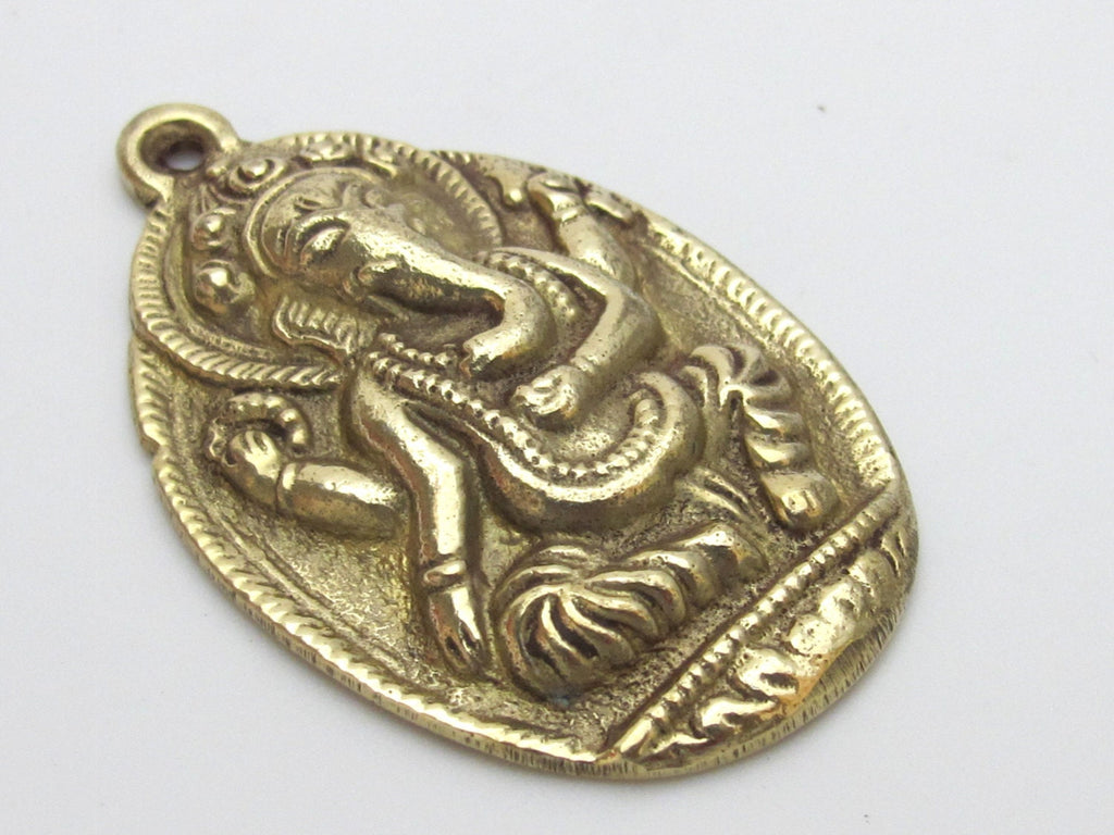 1 pendant - Nepal Large Oval shape ganpati ganesh ganesa ganesha brass pendant from Nepal -- CP013 - custom design copyright Nepalbeadshop