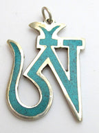 Tibetan silver plated Om pendant with turquoise inlay - PM147
