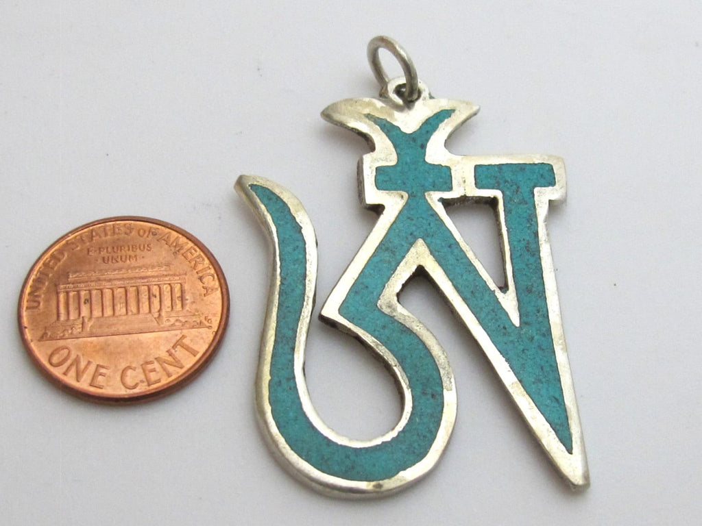 Tibetan silver plated Om pendant with turquoise inlay - PM147