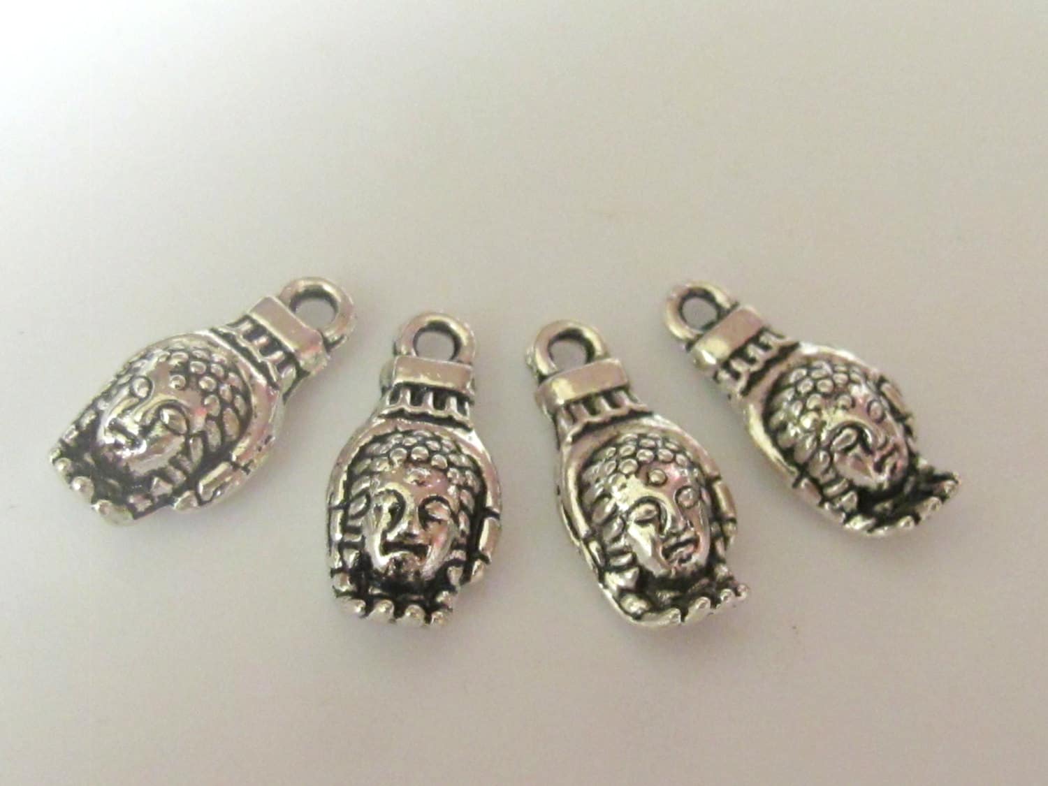 10 pieces - Silver tone Buddha Hand charms - BD445
