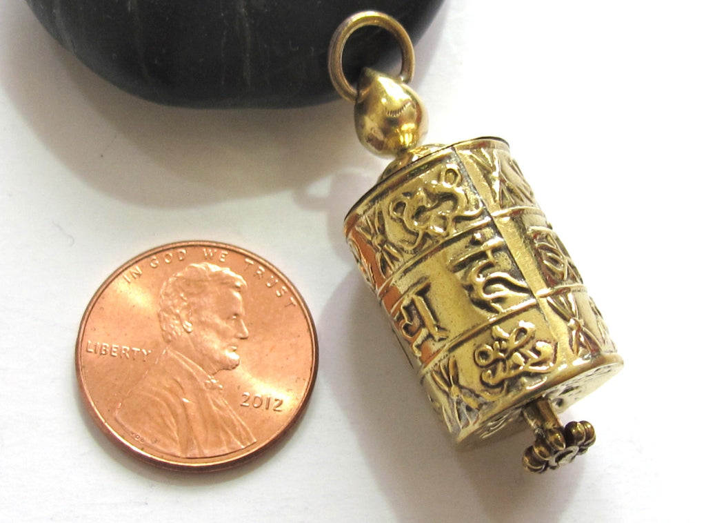 Tibetan Om Mantra light-weight with auspicious symbols spinnable prayer wheel brass pendant with scroll - SP021