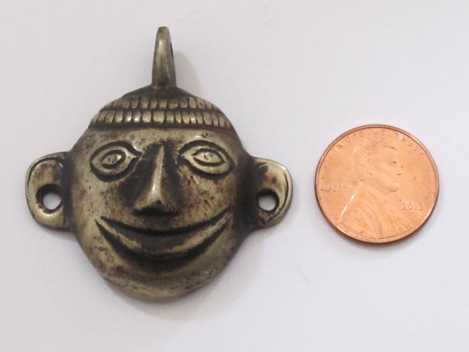 Tribal naga headhunter Brass pendant from Nepal - PM189