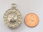 Round shape Tibetan antiqued silver finish Ghau prayer box pendant with buddha eyes symbol and double spiral design - PM191H