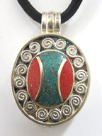 Oval shape Tibetan silver finish Ghau prayer box pendant with turquoise coral inlay and double spiral design - PM191E
