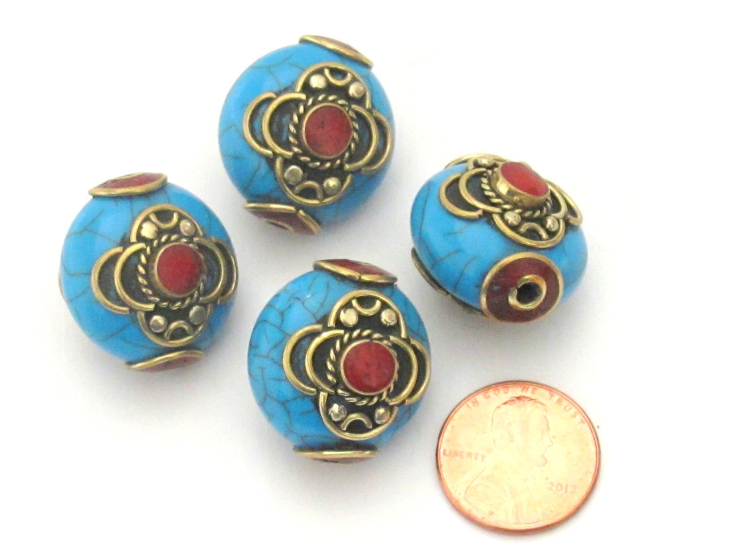 1 BEAD - Beautiful dual sided blue crackle resin horn bead inlaid with brass and - BD504D