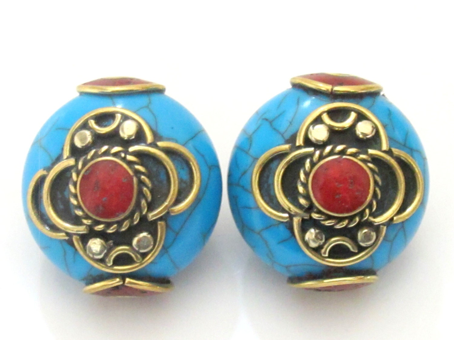 1 BEAD - Beautiful dual sided blue crackle resin horn bead inlaid with brass and - BD504D
