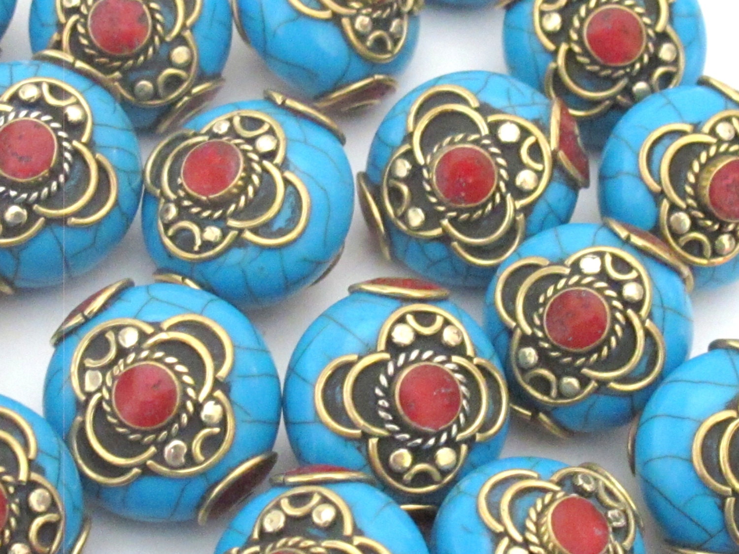 1 BEAD - Beautiful dual sided blue crackle resin horn bead inlaid with brass and - BD504D